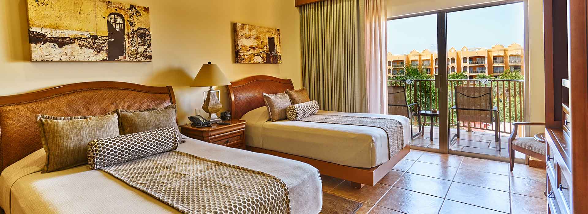junior suite dos camas dobles en The Royal Haciendas