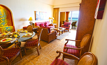 ample living and dining room in suite